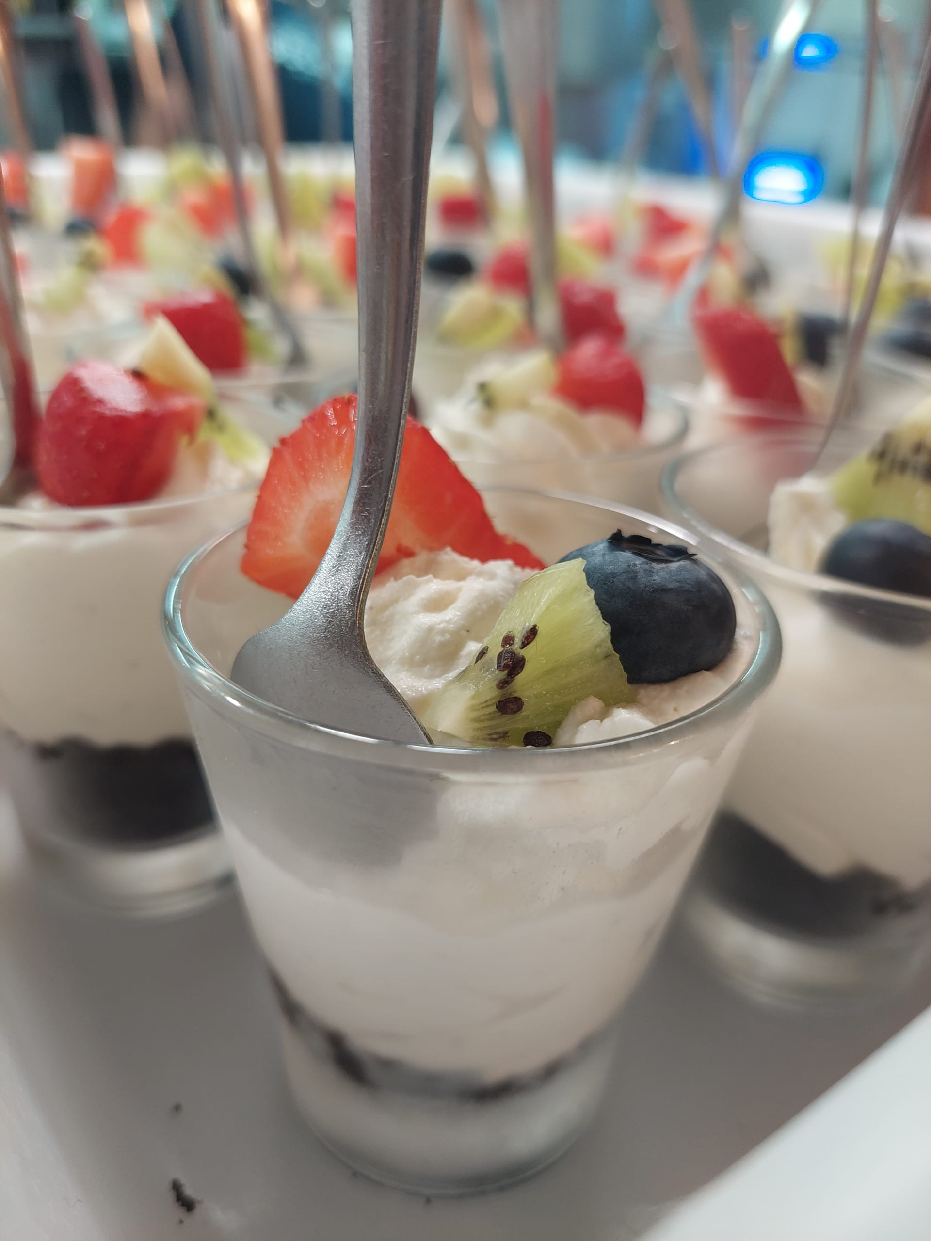 Dessert cups with cream and fresh fruit